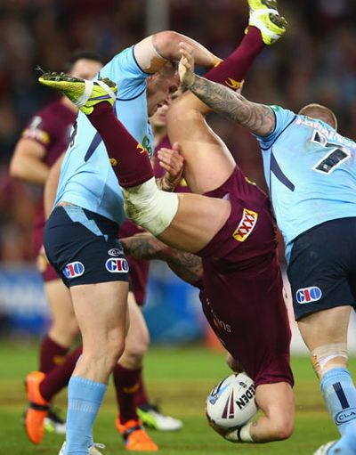 Smith was taken out late after a kick before this lifting tackle on Corey Parker.