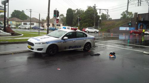 A 19-year-old woman has been hit by a police car in Bankstown. (9NEWS)