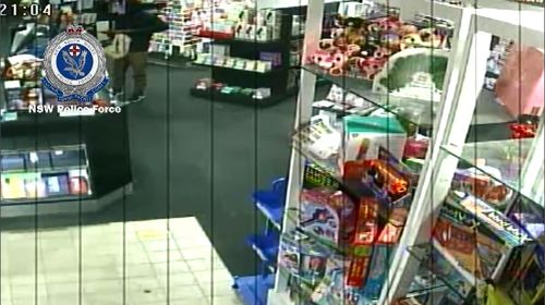 The calm staff member appeared to not hand over any money before the armed man fled. Picture: Supplied.