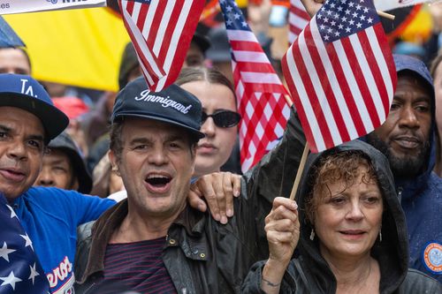Mark Ruffalo and Susan Sarandon, along with thousands of New Yorkers, march in opposition of Donald Trump's presidency