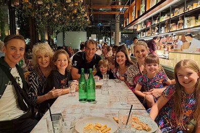 Patti Newton with daughter Lauren, her husband Matt Walsh and their six children.