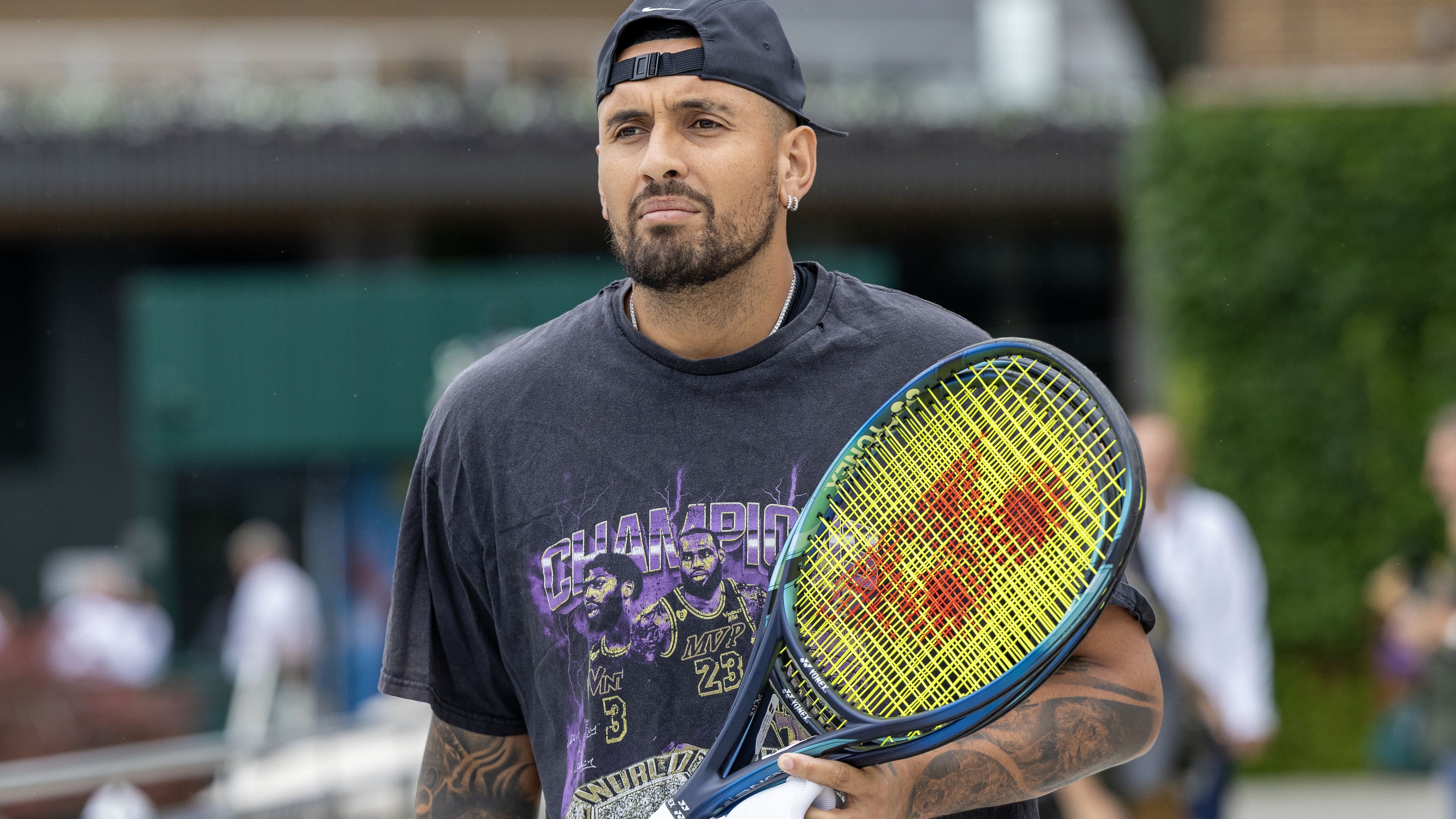 LONDON, ENGLAND - JUNE 30.  Nick Kyrgios of Australia heads for training on the practice courts in preparation for the Wimbledon Lawn Tennis Championships at the All England Lawn Tennis and Croquet Club at Wimbledon on June 30, 2023, in London, England. (Photo by Tim Clayton/Corbis via Getty Images)