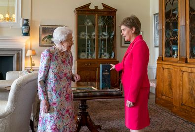 Queen Elizabeth II receives Scottish First Minister Nicola Sturgeon during an audience at the Palace of Holyroodhouse in Edinburgh, as part of her traditional trip to Scotland for Holyrood Week, on June 29, 2022 in Edinburgh, UK. United. 