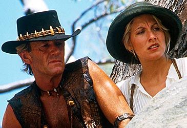 Which organisation pursues Mick Dundee to Australia in Crocodile Dundee II?