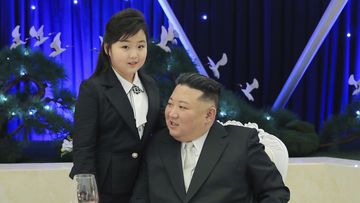 North Korean leader Kim Jong Un and his daughter attend a feast to mark the 75th founding anniversary of the Korean People&#x27;s Army at an unspecified place in North Korea 