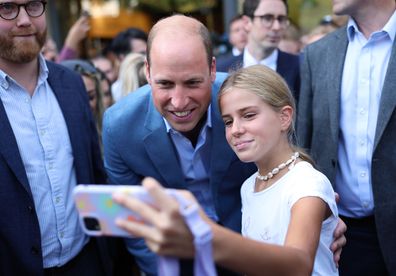 Prince William, Prince of Wales poses for selfies with members of the public as he visits Pret A Manger on September 07, 2023 in Bournemouth, England. 