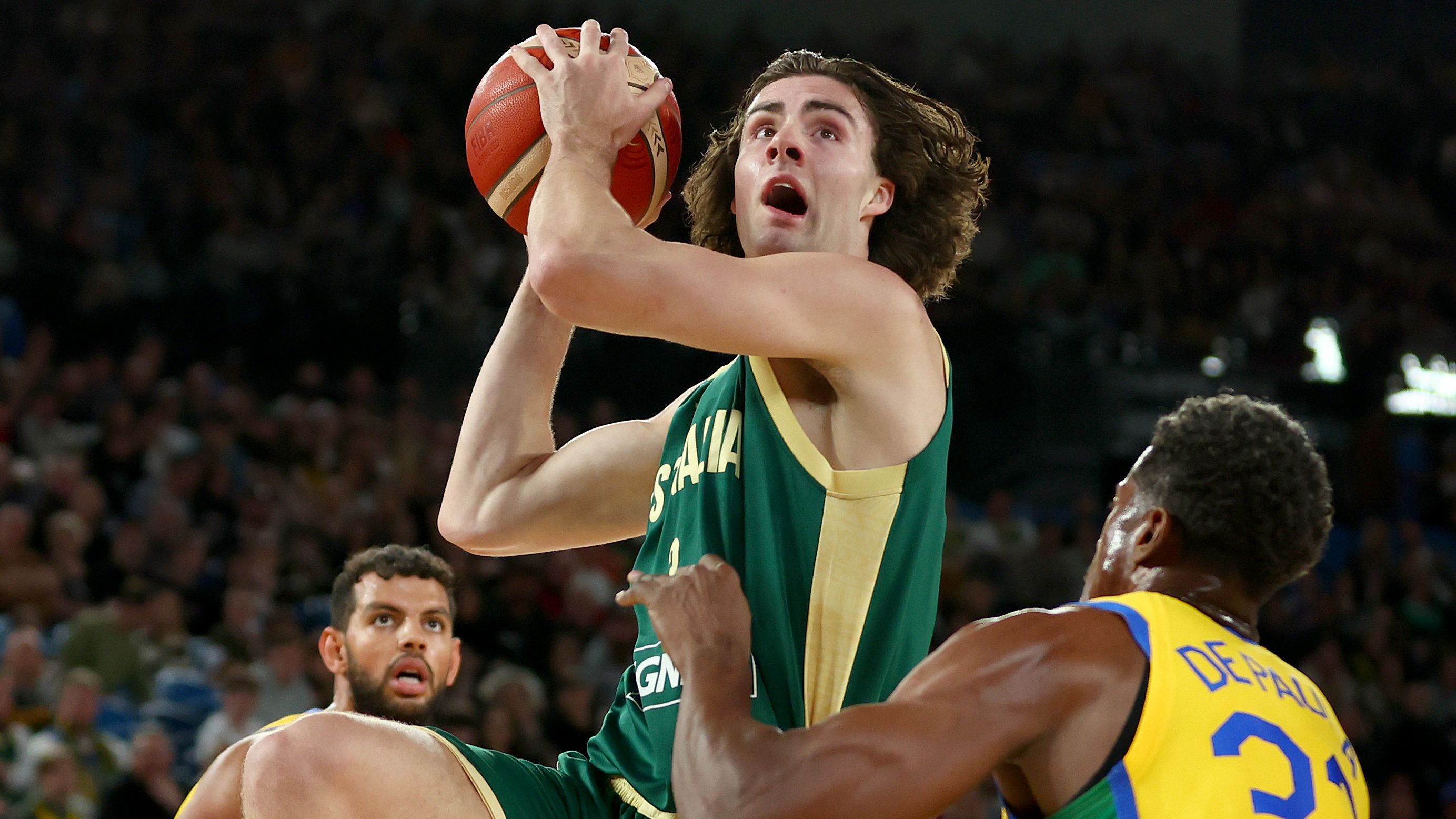 MELBOURNE, AUSTRALIA - AUGUST 16: Josh Giddey of Australia looks towards goal during the match between the Australia Boomers and Brazil at Rod Laver Arena on August 16, 2023 in Melbourne, Australia. (Photo by Graham Denholm/Getty Images)