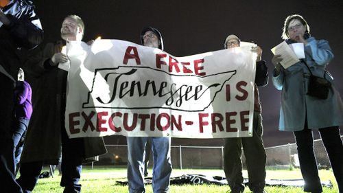 Protesters gather before the execution of Edmund Zagorski at Riverbend Maximum Security Institution ahead of the execution.