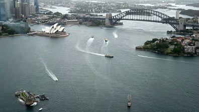 Aerial view of Sydney Harbour on a grey summer day. 