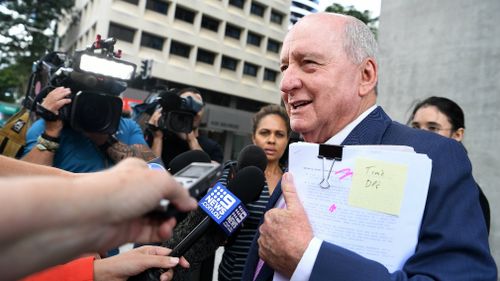 Alan Jones told reporters outside court he had been advised not to say anything. (AAP)