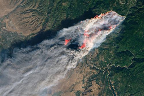 An enhanced satellite image provided by NASA's Earth Observatory showing the Paradise wildfire.