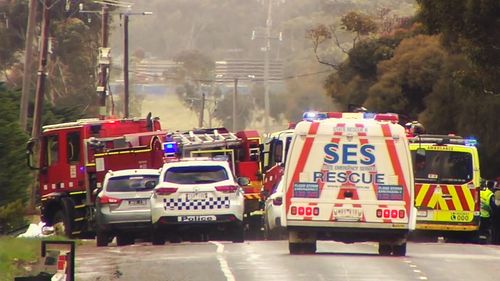 A man has died and two people have been arrested after a fatal car crash in Melbourne.