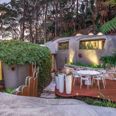 Hollander House in Sydney’s Newport resembles a rock with its wacky cement build