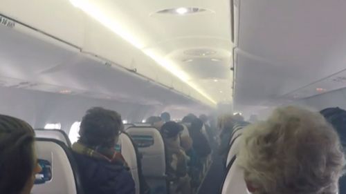 Passengers were told to evacuate the plane in Canada, after smoke filled the cabin. Picture: Robin Thacker