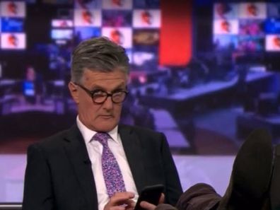 BBC News host caught with feet up on desk