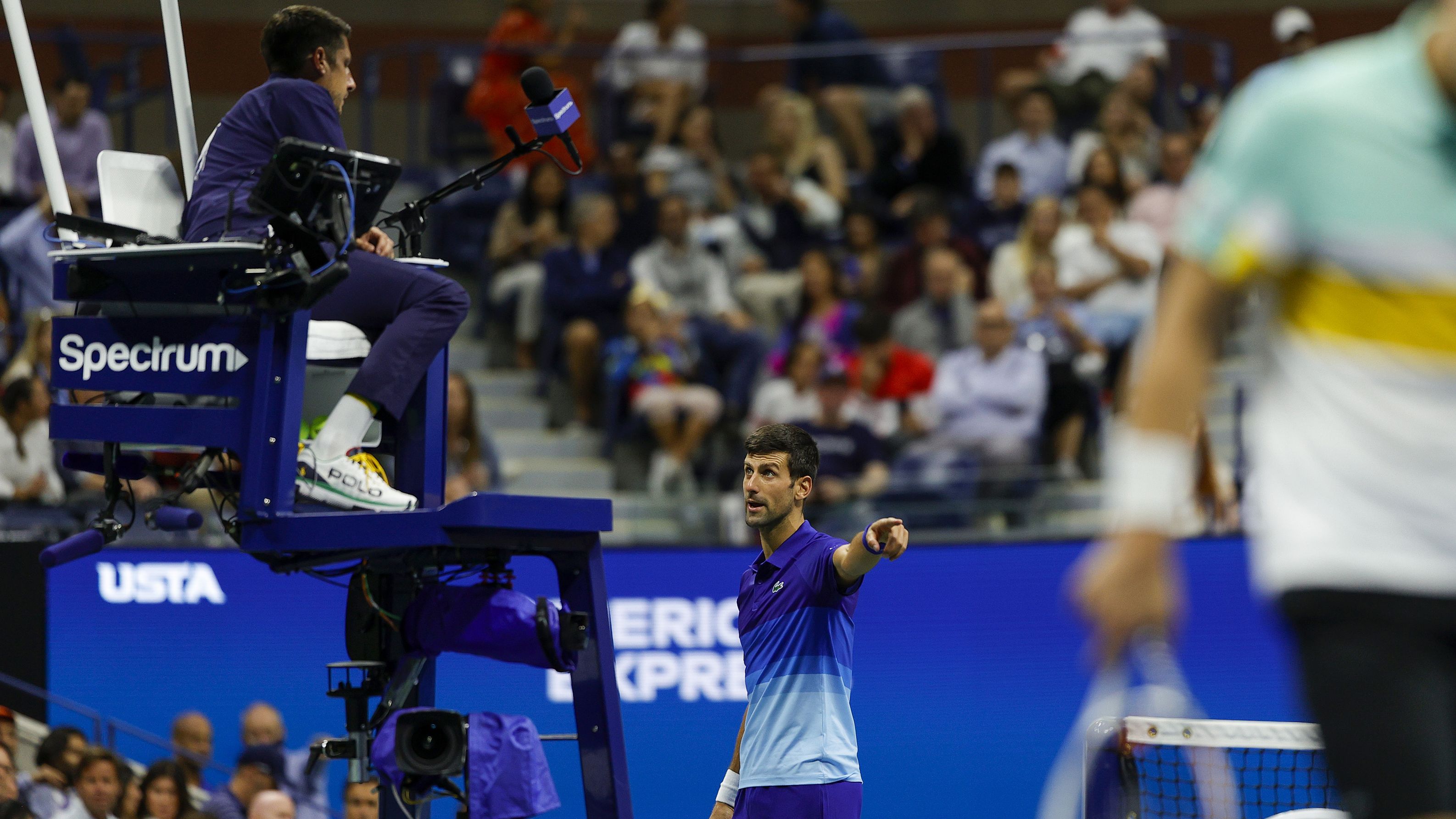 Irritated Djokovic stares down 'screaming' fan