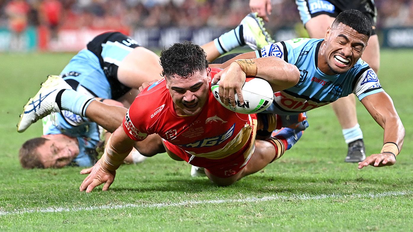 Valynce Te Whare of the Dolphins breaks through the defence to score a try during the round 10 NRL match between Cronulla Sharks and Dolphins at Suncorp Stadium on May 06, 2023 in Brisbane, Australia. (Photo by Bradley Kanaris/Getty Images)