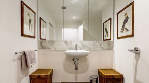 One of two marble bathrooms.