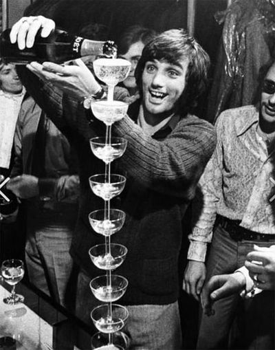 Football legend George Best was known for his champagne lifestyle. (Supplied)