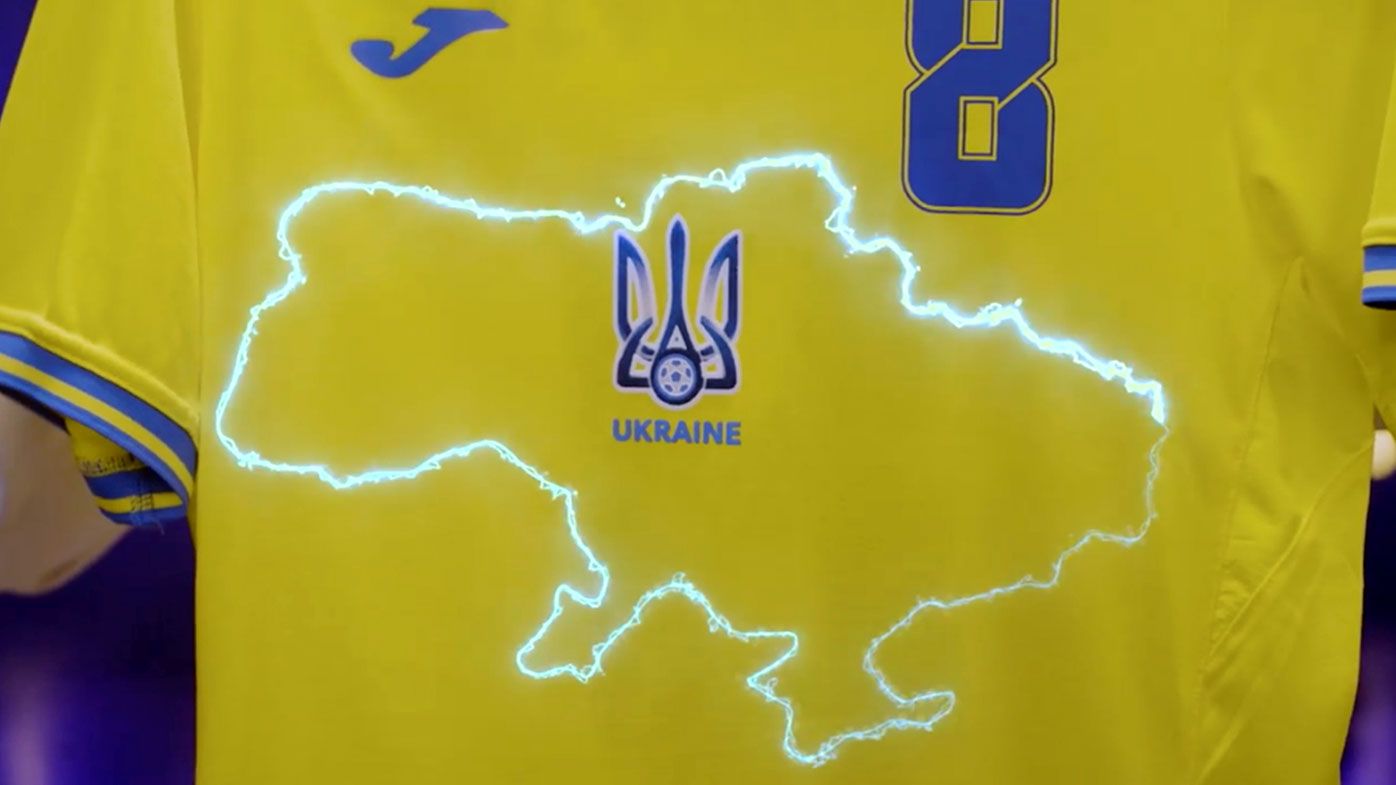 This handout photo taken from a video released by President of Ukrainian Association of Football Andrii Pavel Pavelko via Facebook, shows a new Ukraine&#x27;s uniform for Ukrainian national soccer team that lights showing a map of Ukraine including Russian-annexed Crimea, Ukraine, Monday, June 7, 2021. RP)