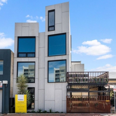 Eight shipping containers rise and surprise on Adelaide's smallest block