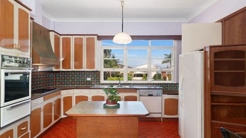 Real estate Sydney retro house listing kitchen Domain