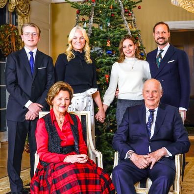 King Harald of Norway and wife Queen Sonja with Crown Prince Haakon and wife Crown Princess Mette-Marit and their two children Princess Ingrid Alexandra, 17, and Prince Sverre Magnus, 16 in the royal Christmas card photo