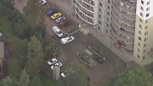 Police have set up a crime scene outside a Westmead block of apartments. (9NEWS)