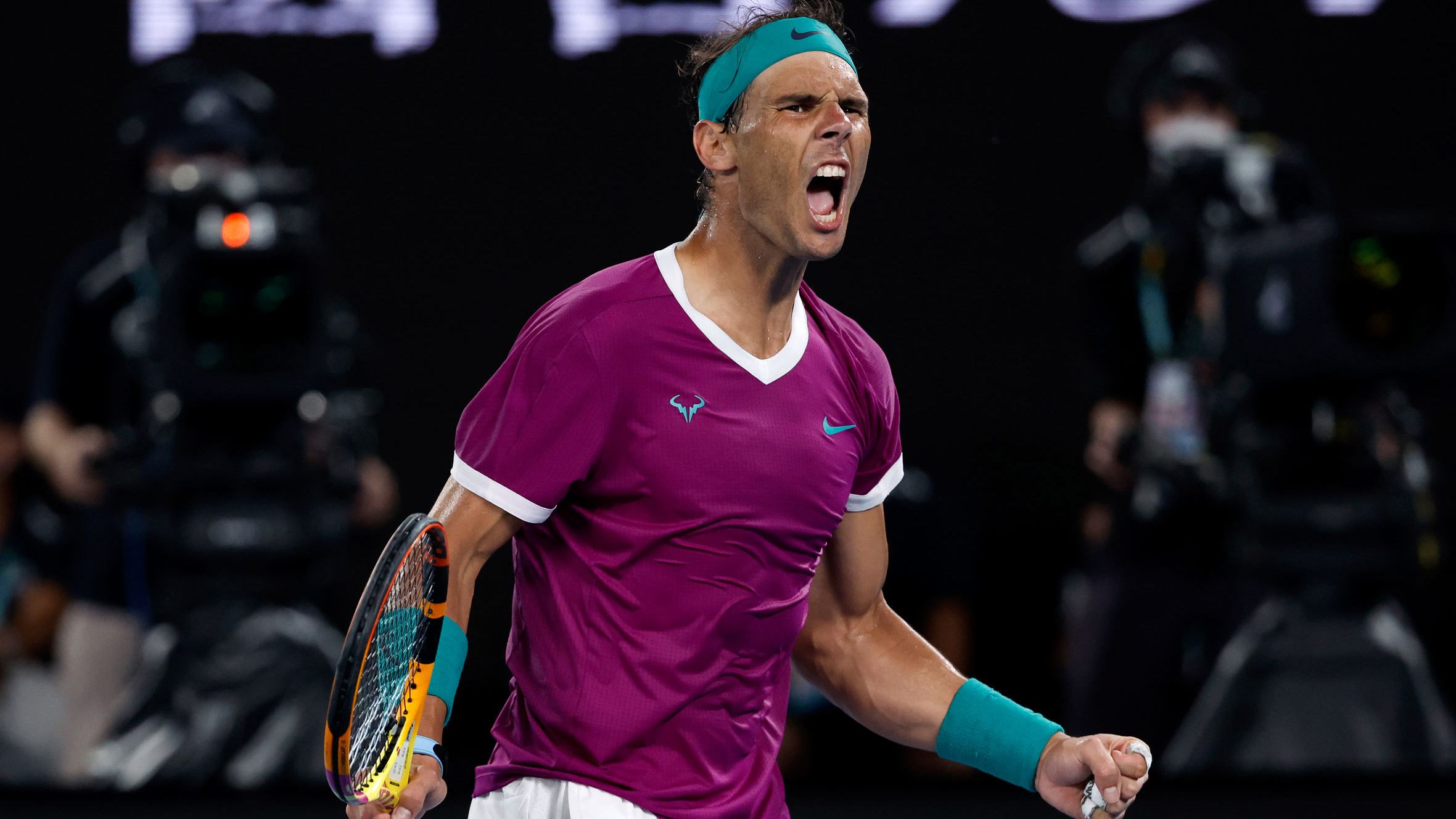 Rafael Nadal of Spain reacts after winning the third set against Daniil Medvedev of Russia during the men&#x27;s singles final at the Australian Open tennis championships in Melbourne, Australia, Sunday, Jan. 30, 2022. 