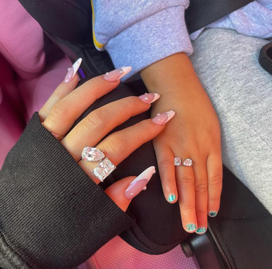 Kylie Jenner shows of matching toi et moi ring with daughter, Stormi.