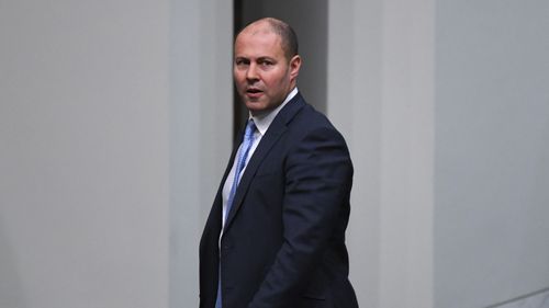 Josh Frydenberg has urged investors not to panic as the US-China trade war heats up.