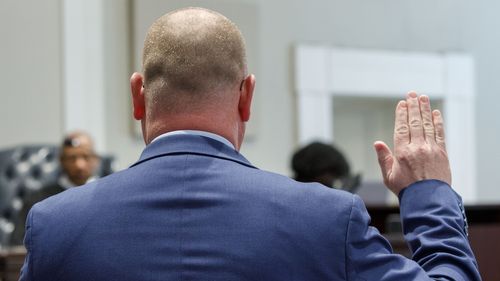 SLED agent David Owen is sworn in for the Alex Murdaugh trial at the Colleton County Courthouse in Walterboro, S.C., on Wednesday, Feb. 15, 2023. The 54-year-old attorney is standing trial on two counts of murder in the shootings of his wife and son at their Colleton County, S.C., home and hunting lodge on June 7, 2021. (Grace Beahm Alford/The Post And Courier via AP, Pool)