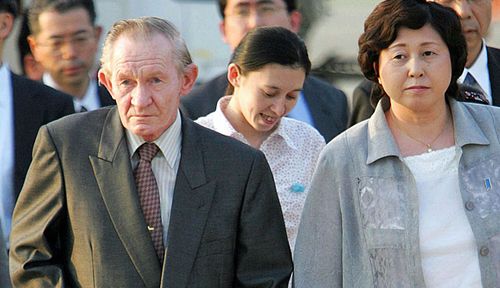 U.S. Army deserter to North Korea, Charles Jenkins, left, escorted by his wife Hitomi Soga. (Photo: AP).