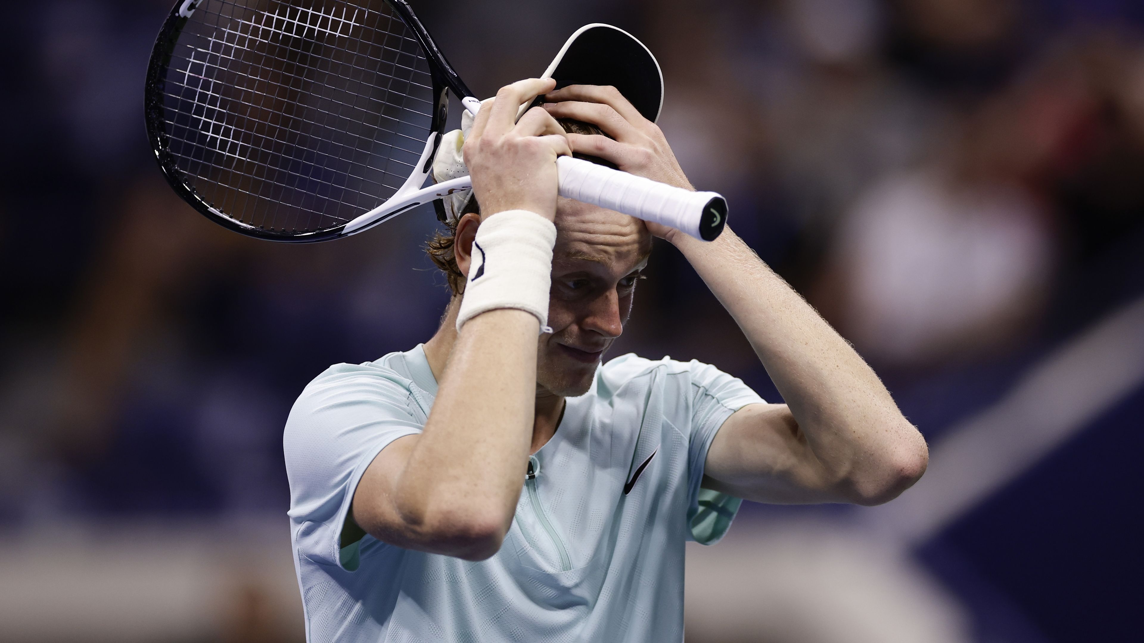 Jannik Sinner reacts during his fourth-round match against Alexander Zverev at the US Open.