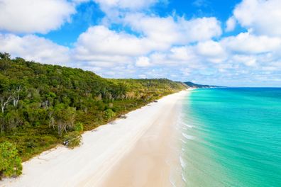 Pristine white sand beach on the western side of Fraser Island, QLD, Australia - K'gari