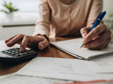 Woman paying bills.