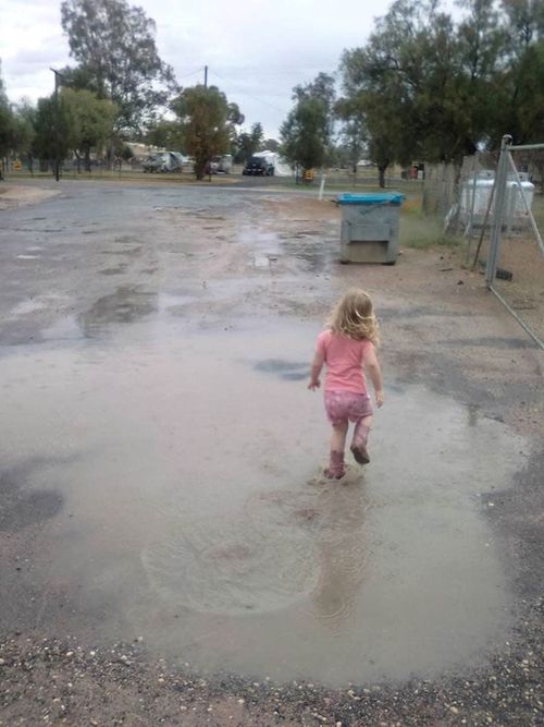 Nikki Jane shared a picture of a young girl in gumboots stomping in a puddle after this week's heavy rain.