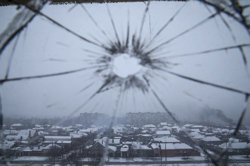 A view from a hospital window broken by shelling in Mariupol, Ukraine, Thursday, March 3, 2022. 