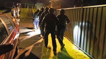 Officers from the Raptor Squad on an operation in Maitland.