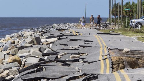 Storm surges caused damage across Florida. (AFP)