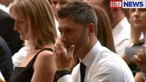 Michael Clarke sheds a tear inside the Phillip Hughes funeral. (Nine News)
