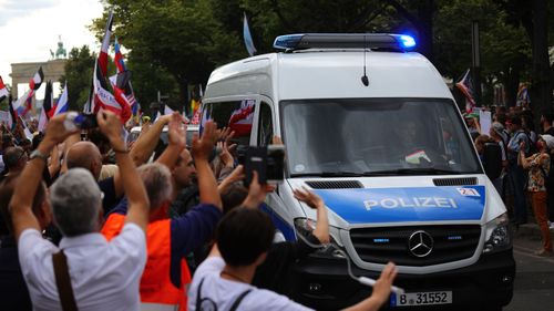 Coronavirus skeptics and right-wing extremists march in protest against coronavirus-related restrictions and government policy on August 29, 2020 in Berlin, Germany.