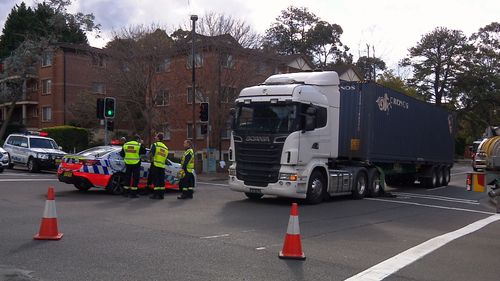 The woman, who has not been formally identified, died at the scene and the truck driver was taken to hospital for mandatory testing. Picture: 9NEWS.