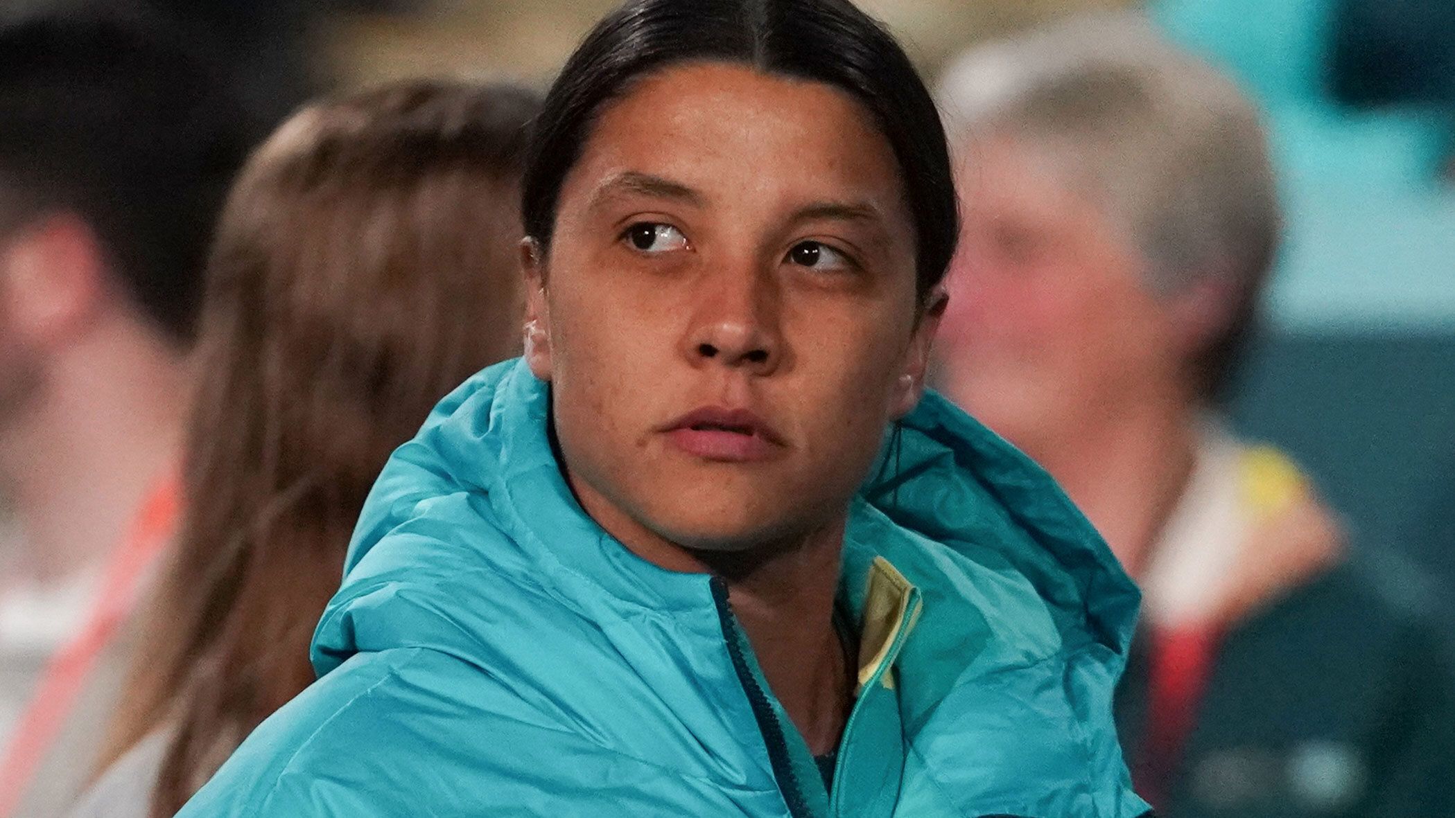 An emotional Sam Kerr is pictured on the sideline as the Matildas get their World Cup campaign started against Ireland.