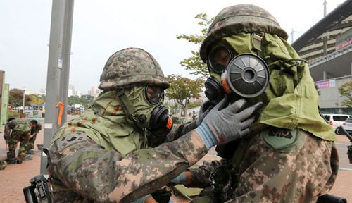 War drills include preparing for chemical and biological warfare. (AP).
