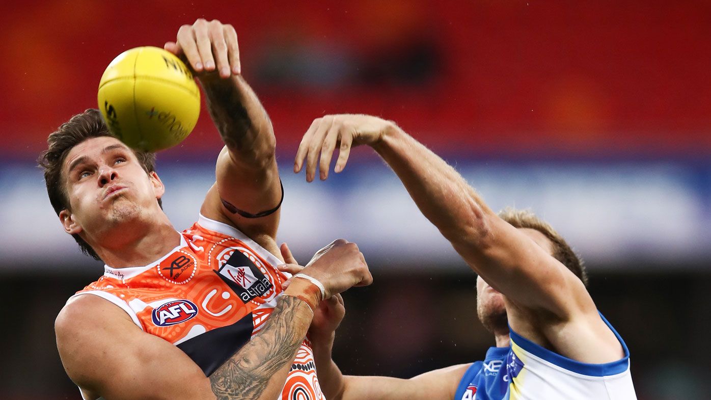 Two Giants hurt in huge AFL win over Suns