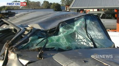 The driver and a young boy suffered minor injuries. (9NEWS)