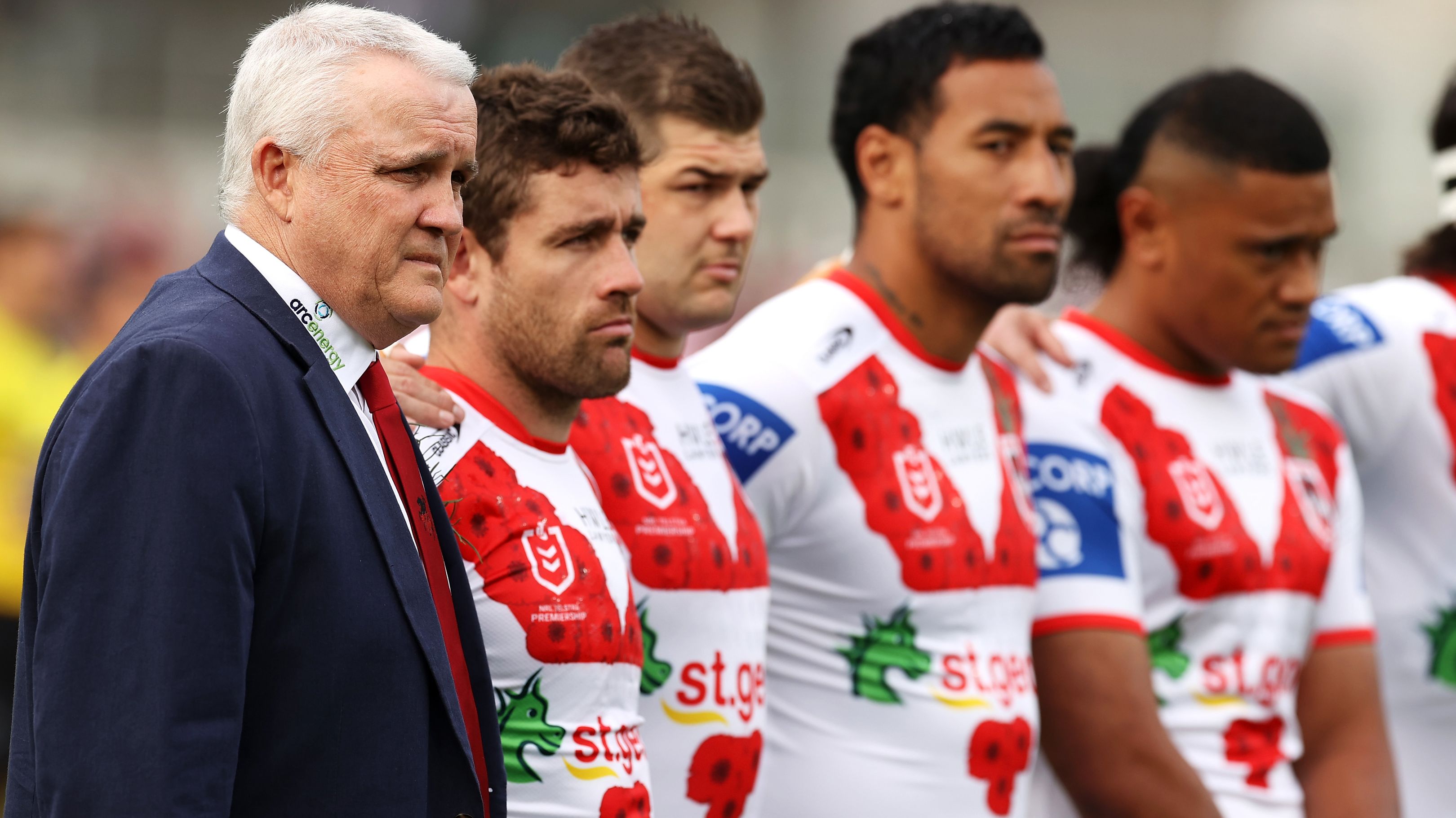 Dragons coach Anthony Griffin stands with the team for the anthems during the Anzac Day ceremony in 2022. (Photo by Mark Kolbe/Getty Images)