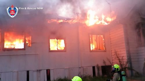 Firefighters battle the blaze in Lakemba. (Supplied)