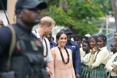 Prince Harry and Meghan visit children at the Lights Academy in Abuja, Nigeria, Friday, May 10, 2024. 